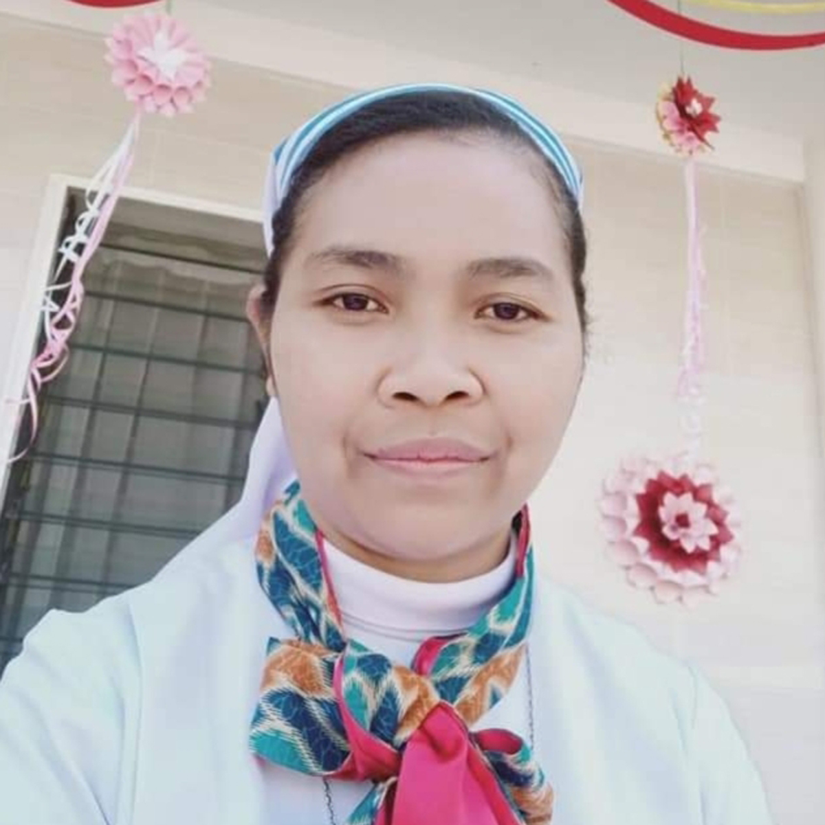 YUSTINA ERNI